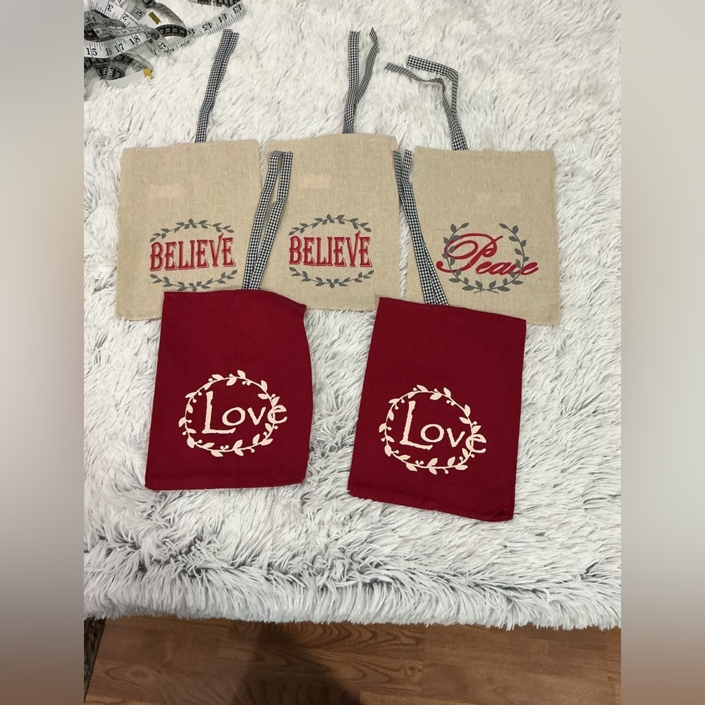 Collections Etc burlap holiday gift bags with 3 different patterns